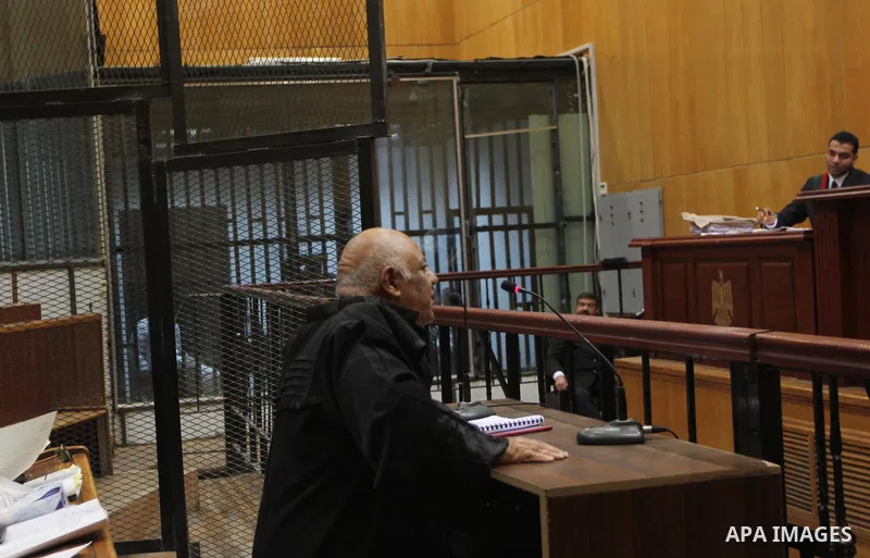 A lawyer speaks to judges during the trial of suspects in the 'Port Said Massacre' case in Cairo on April 6, 2015. The defendants were originally given sentences ranging from 15 years to life in prison. They were convict...