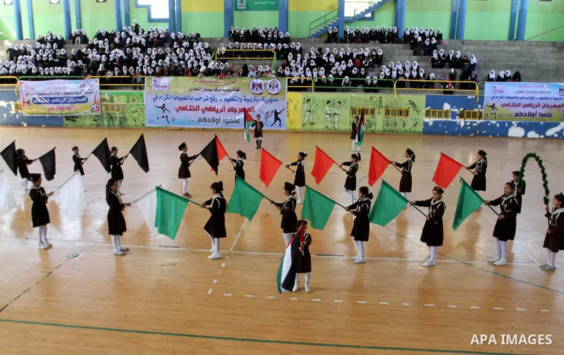 Palestinian students demonstrate their skills during the sports festival organised by the ministry of education in Rafah in the southern Gaza Strip, April 6, 2015. Photo by Abed Rahim Khatib