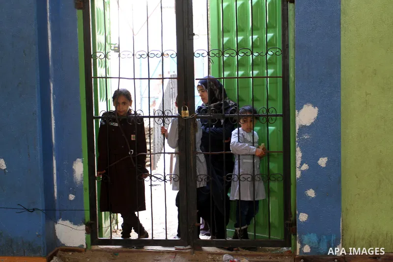 Palestinian students attend the sports festival organised by the ministry of education in Rafah in the southern Gaza Strip, April 6, 2015. Photo by Abed Rahim Khatib