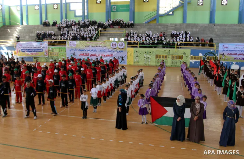 Palestinian students demonstrate their skills during the sports festival organised by the ministry of education in Rafah in the southern Gaza Strip, April 6, 2015. Photo by Abed Rahim Khatib