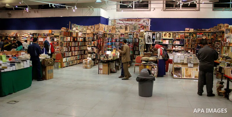 Egyptians attend the eleventh Alexandrina International Book Fair, in Alexandria Egypt on April 06, 2015. Photo by Amr Sayed