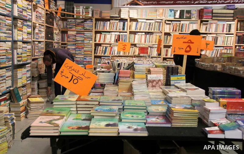 Egyptians attend the eleventh Alexandrina International Book Fair, in Alexandria Egypt on April 06, 2015. Photo by Amr Sayed