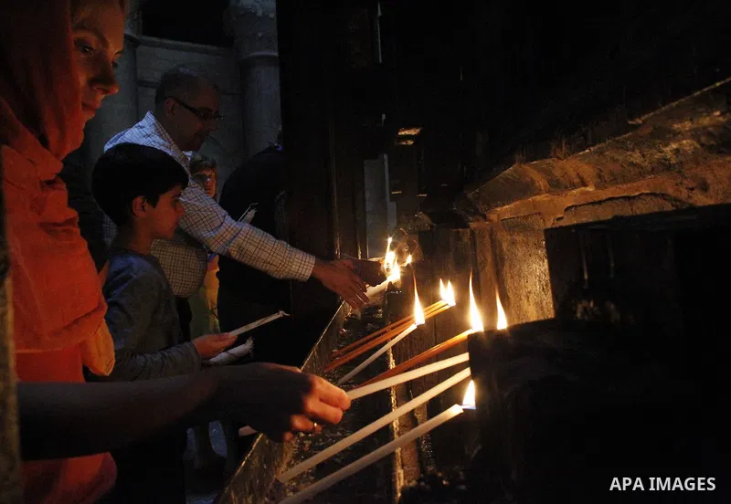 Christian worshipers pray in the Church of the Holy Sepulcher, traditionally believed by many to be the site of the crucifixion and burial of Jesus Christ, part of their Easter pilgrimage to the Holy Land, in Jerusalem's...