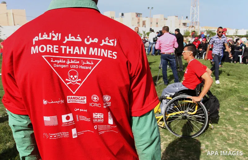 Disabled Palestinians participate in a race during an event organized by United Nations at a U.N-run training center in Khan Younis in the southern Gaza Strip April 8, 2015. The event was aimed at raising awareness on th...