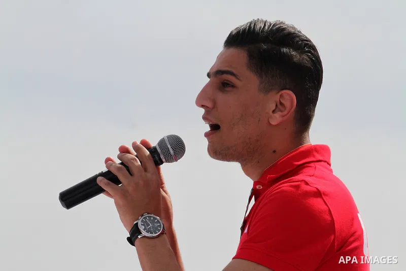 Palestinian Arab Idol Mohammed Assaf, performs during an event organized by United Nations at a U.N-run training center in Khan Younis in the southern Gaza Strip April 8, 2015. The event was aimed at raising awareness on...