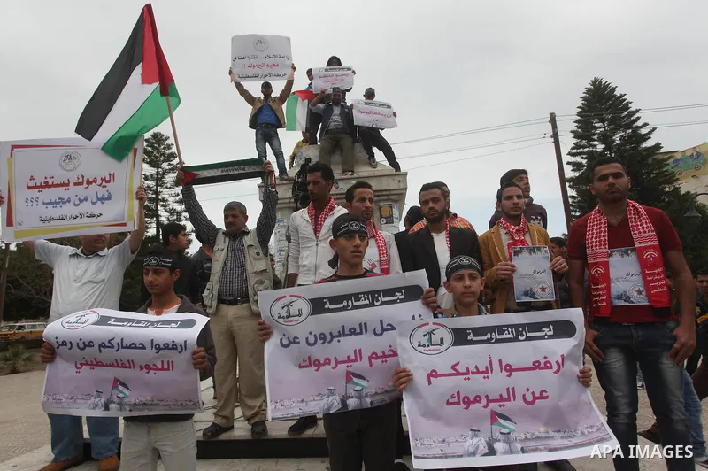 Palestinian factions take part a protest to show solidarity with the Palestinians living in Syria's Yarmouk camp, which is besieged by government forces and has been largely overrun by jihadist fighters, in Gaza city on...