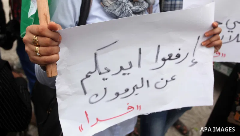 Palestinian factions take part a protest to show solidarity with the Palestinians living in Syria's Yarmouk camp, which is besieged by government forces and has been largely overrun by jihadist fighters, in Gaza city on...