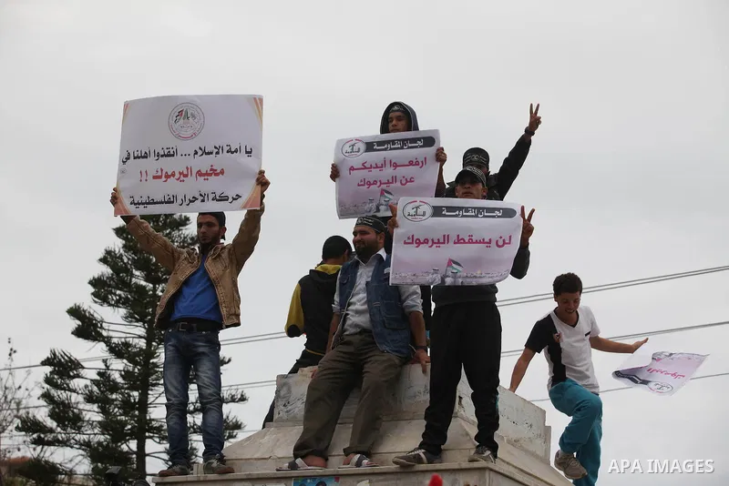 Palestinian factions take part a protest to show solidarity with the Palestinians living in Syria's Yarmouk camp, which is besieged by government forces and has been largely overrun by jihadist fighters, in Gaza city on...