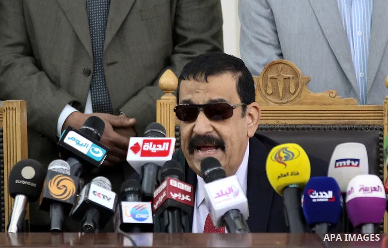 Head of Giza Criminal Court, Judge Mohamed Nagy Shehata speaks during the trial of Muslim brotherhood leaders in Cairo, April 11, 2015. An Egyptian court sentenced Mohamed Badie, the leader of the outlawed Muslim Brother...
