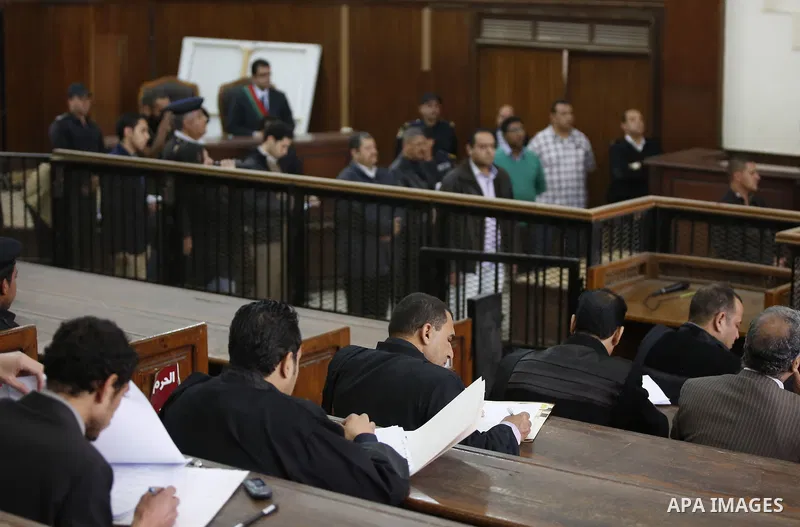 lawyers attend the trial of Muslim brotherhood leaders in Cairo, April 11, 2015. An Egyptian court sentenced Mohamed Badie, the leader of the outlawed Muslim Brotherhood, and 13 other senior members of the group to death...