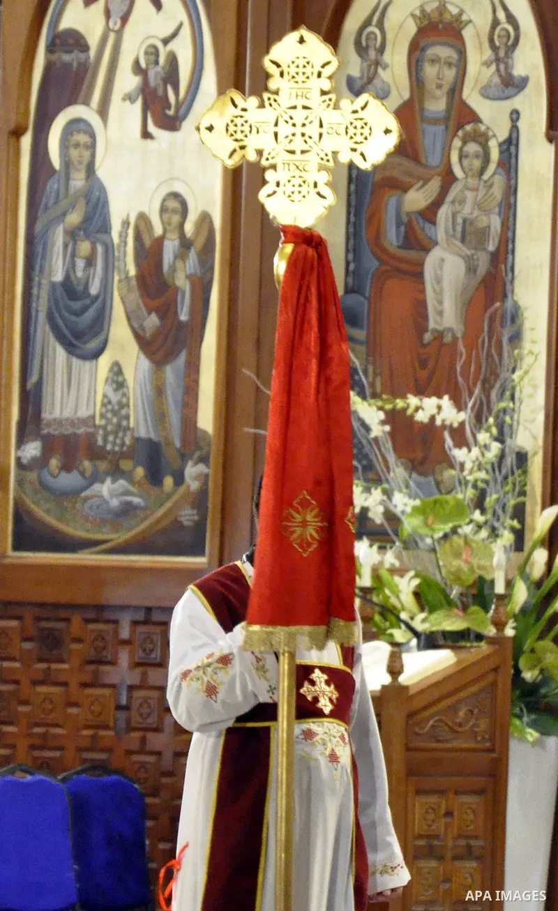 Egyptian Coptic Christians attend the Orthodox Easter mass led by Coptic Pope Tawadros II, head of the Coptic Orthodox church at the main cathedral in Cairo April 11, 2015. Photo by Amr Sayed