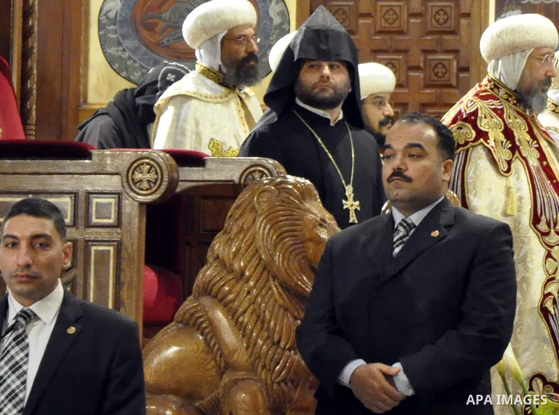 Coptic Pope Tawadros II, head of the Coptic Orthodox church, takes part in a ritual as part of a Coptic Orthodox Easter mass at the main cathedral in Cairo April 11, 2015. Photo by Amr Sayed