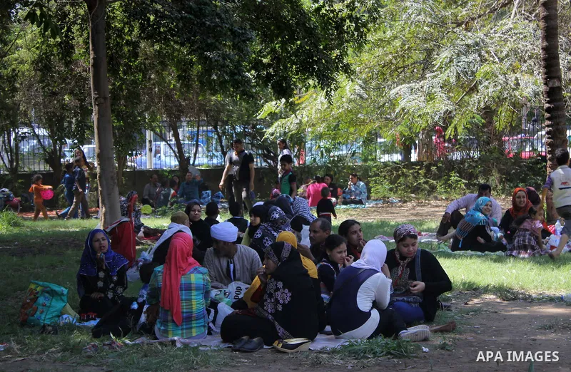 Egyptians visit the spring flower exhibition held at Orman Botanical Garden in Giza, Egypt, on April 13, 2015. Egyptians celebrate the Sham El Nessim, or the Festival of Spring Breeze, which marks the beginning of spring...