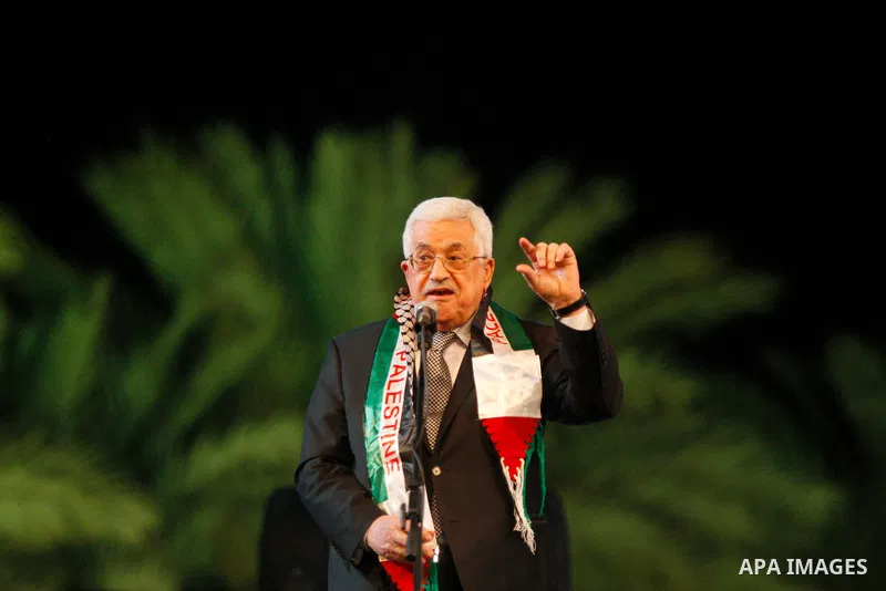 Palestinian President Mahmoud Abbas speaks during the national mass wedding ceremony, in the West Bank city of Jericho, April 20, 2015. Nearly 462 Palestinian couples were married in a ceremony organised by Palestinian p...