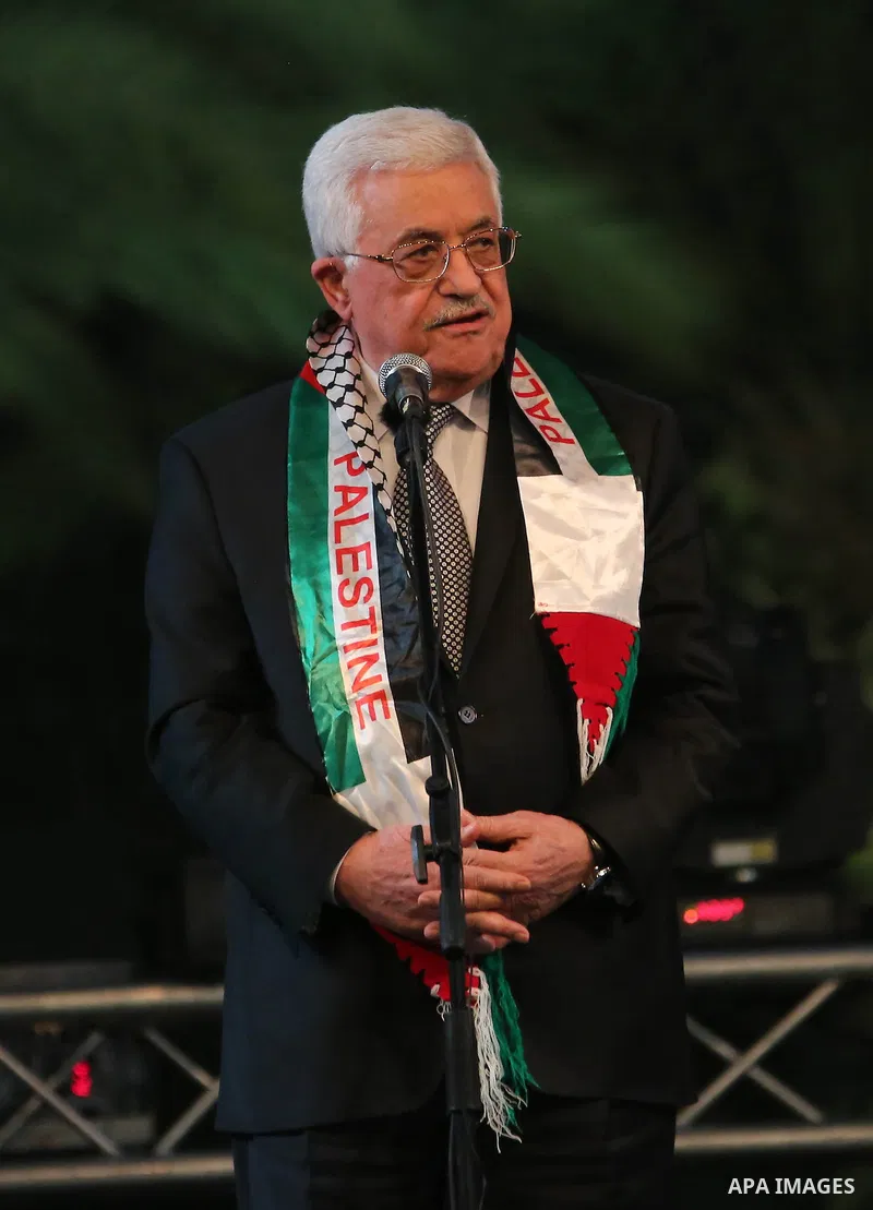 Palestinian President Mahmoud Abbas attends the national mass wedding ceremony, in the West Bank city of Jericho, April 20, 2015. Nearly 462 Palestinian couples were married in a ceremony organised by Palestinian preside...