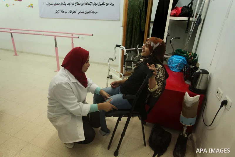 Lana Al-Kronz, 26-year-old Palestinian specialist of prosthetic works on an artificial leg at a center of prosthetic limbs, in Gaza City on April 21, 2015. Al-Krunz is the first Palestinian woman which makes the prosthet...