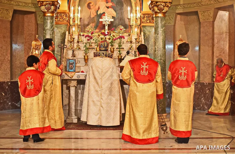 Egyptian Coptic Christians celebrate during a commemorate the 100th anniversary of the 1915 Armenian genocide at the Coptic Orthodox Church in Cairo on April 24, 2015. Historians estimate up to 1.5 million Armenians were...