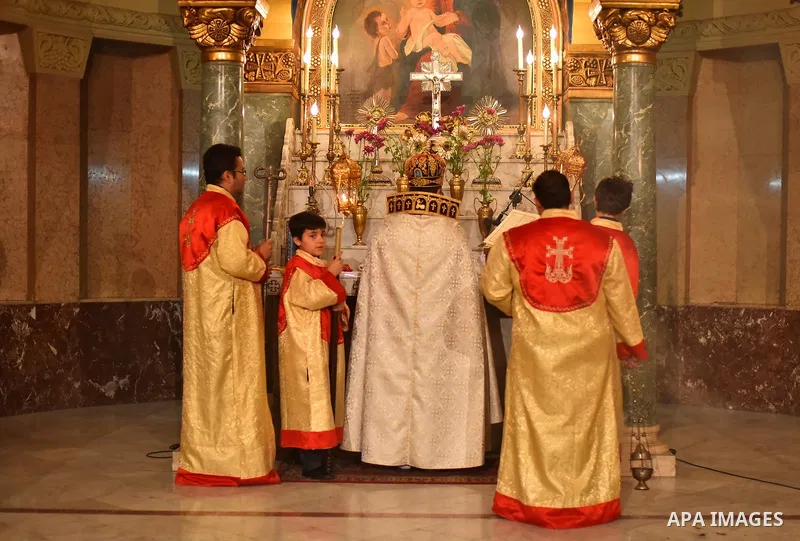 Egyptian Coptic Christians celebrate during a commemorate the 100th anniversary of the 1915 Armenian genocide at the Coptic Orthodox Church in Cairo on April 24, 2015. Historians estimate up to 1.5 million Armenians were...