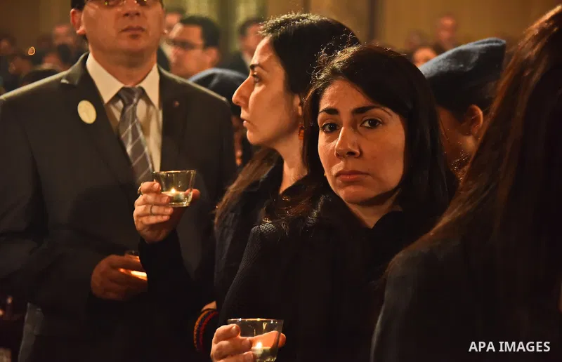 Egyptian Coptic Christians celebrate during a commemorate the 100th anniversary of the 1915 Armenian genocide at the Coptic Orthodox Church in Cairo on April 24, 2015. Historians estimate up to 1.5 million Armenians were...