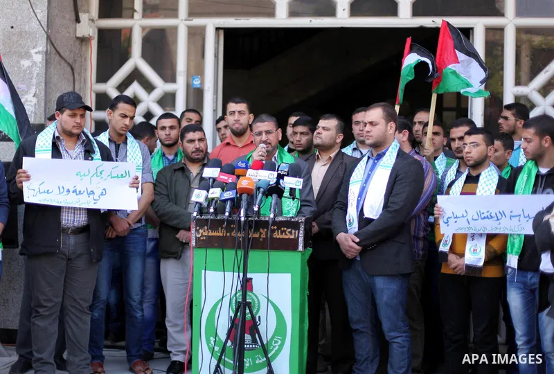 Spokesman of Hamas movement in Gaza Strip, Sami Abu Zuhri, speaks during a protest against political arrests in the West Bank, in Gaza City, on April 26, 2015. Photo by Ashraf Amra