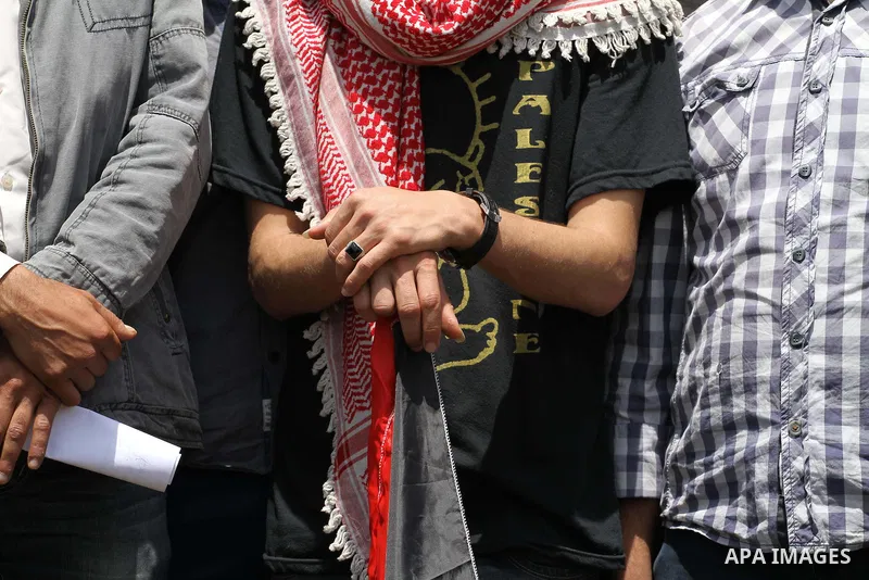 Palestinian supporters of April 29," take part a rally in Gaza City, on April 28, 2015. Photo by Mohammed Asad