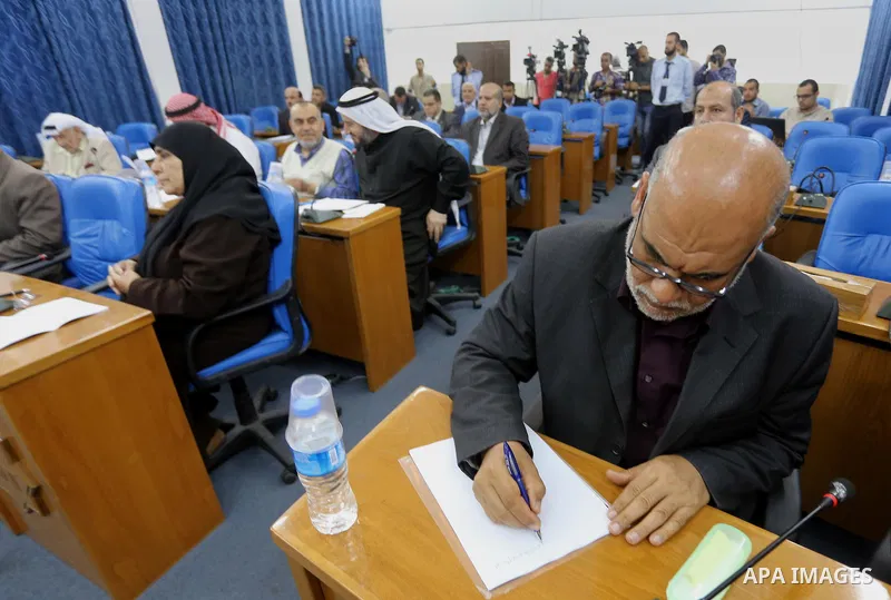 Members of the Palestinian legislative council from Hamas movement attend a meeting at the legislative council in Gaza city on April 29, 2015. Photo by Mohammed Asad