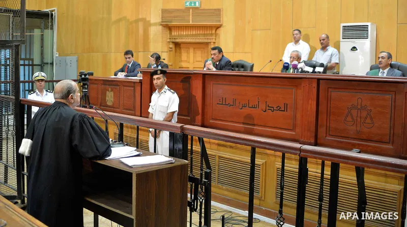 Lawyer speaks to Judge during the trial of former Egyptian President Hosni Mubarak in Cairo, Egypt, 29 April 2015. Mubarak appeared in the retrial session on charges of fraudulently spending millions of dollars on his pr...