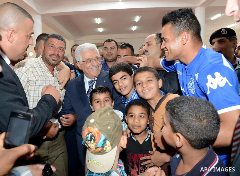 Palestinian President Mahmoud Abbas attends an opening ceremony, at al-Istiqlal University in the West Bank city of Jericho on May 1, 2015. Photo by Osama Falah