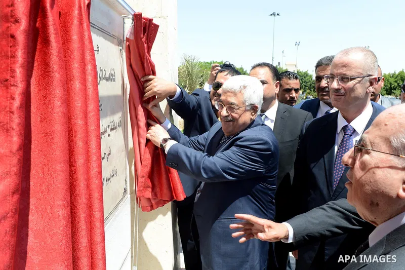 Palestinian President Mahmoud Abbas attends an opening ceremony, at al-Istiqlal University in the West Bank city of Jericho on May 1, 2015. Photo by Osama Falah