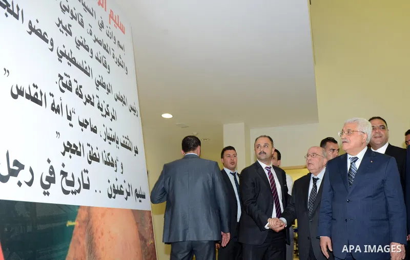 Palestinian President Mahmoud Abbas attends an opening ceremony, at al-Istiqlal University in the West Bank city of Jericho on May 1, 2015. Photo by Osama Falah