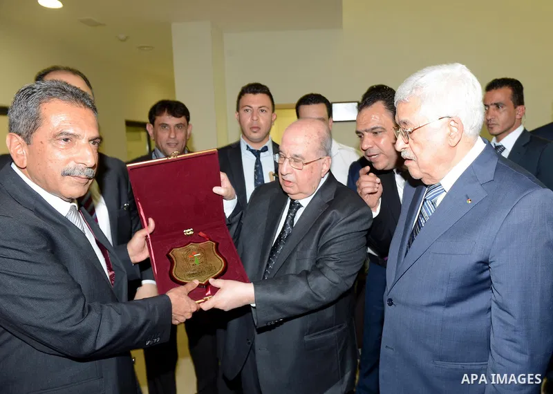 Palestinian President Mahmoud Abbas attends an opening ceremony, at al-Istiqlal University in the West Bank city of Jericho on May 1, 2015. Photo by Osama Falah