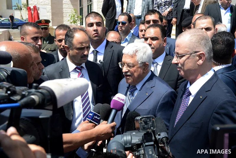 Palestinian President Mahmoud Abbas attends an opening ceremony, at al-Istiqlal University in the West Bank city of Jericho on May 1, 2015. Photo by Osama Falah