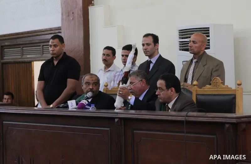 The Judge displays the weapons used by Ansar Bait Al-Maqdis group, during their trial in Cairo on May 3, 2015. Cairo criminal court Sunday adjourned the trial of 213 suspects of Ansar Bait Al-Maqdis group, on charges of...