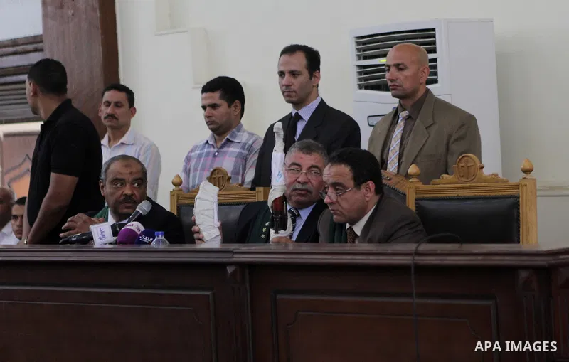 The Judge displays the weapons used by Ansar Bait Al-Maqdis group, during their trial in Cairo on May 3, 2015. Cairo criminal court Sunday adjourned the trial of 213 suspects of Ansar Bait Al-Maqdis group, on charges of...