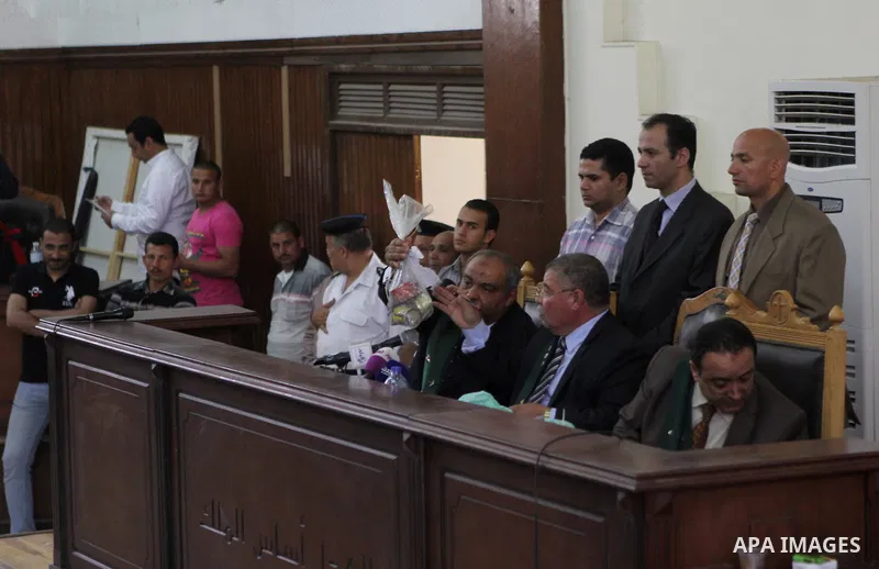 The Judge displays the weapons used by Ansar Bait Al-Maqdis group, during their trial in Cairo on May 3, 2015. Cairo criminal court Sunday adjourned the trial of 213 suspects of Ansar Bait Al-Maqdis group, on charges of...