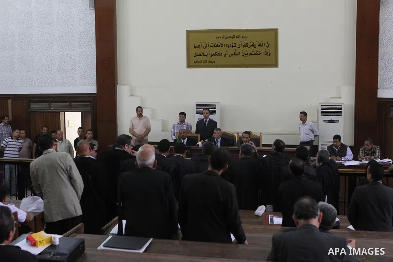 The Judge speaks during the trial of Ansar Bait Al-Maqdis group, in a court in Cairo on May 3, 2015. Cairo criminal court Sunday adjourned the trial of 213 suspects of Ansar Bait Al-Maqdis group, on charges of assassinat...