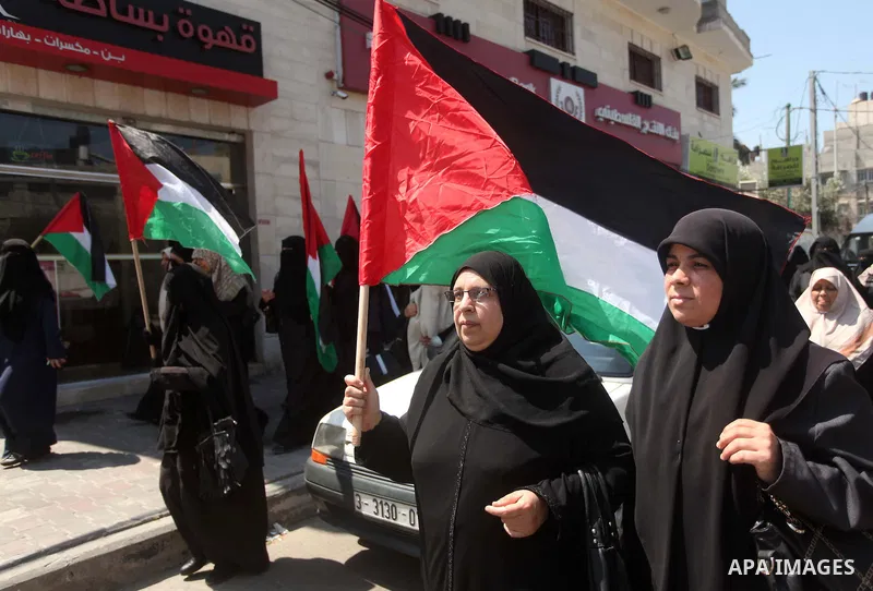 Palestinian women, supporters of the Hamas movement, take part in a demonstration ahead of the commemorations of the 67th anniversary of the "Nakba", in front of the office of the High Commissioner for Human Rights in Ga...