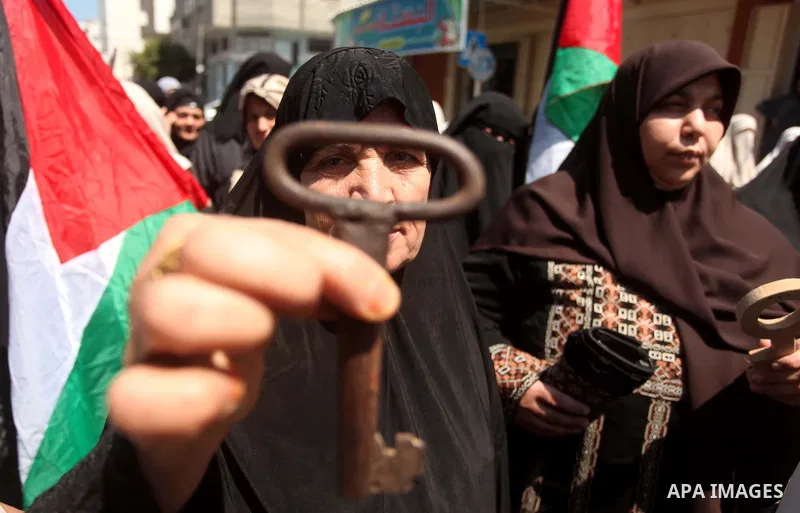 Palestinian women, supporters of the Hamas movement, take part in a demonstration ahead of the commemorations of the 67th anniversary of the "Nakba", in front of the office of the High Commissioner for Human Rights in Ga...