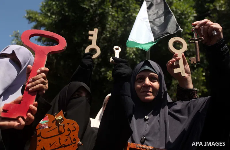 Palestinian women, supporters of the Hamas movement, take part in a demonstration ahead of the commemorations of the 67th anniversary of the "Nakba", in front of the office of the High Commissioner for Human Rights in Ga...