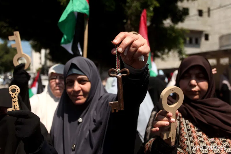 Palestinian women, supporters of the Hamas movement, take part in a demonstration ahead of the commemorations of the 67th anniversary of the "Nakba", in front of the office of the High Commissioner for Human Rights in Ga...