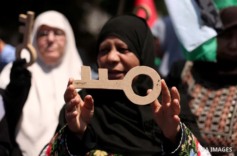 Palestinian women, supporters of the Hamas movement, take part in a demonstration ahead of the commemorations of the 67th anniversary of the "Nakba", in front of the office of the High Commissioner for Human Rights in Ga...