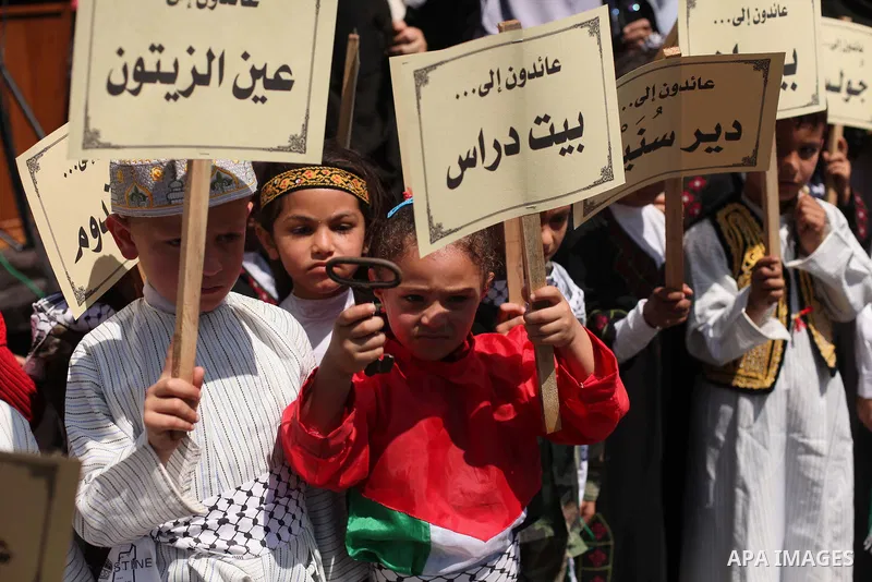 Palestinian children take part in a demonstration ahead of the commemorations of the 67th anniversary of the "Nakba", in front of the office of the High Commissioner for Human Rights in Gaza City on May 6, 2015. "Nakba"...