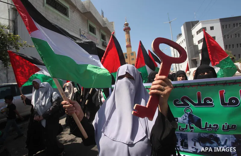 Palestinian women, supporters of the Hamas movement, take part in a demonstration ahead of the commemorations of the 67th anniversary of the "Nakba", in front of the office of the High Commissioner for Human Rights in Ga...