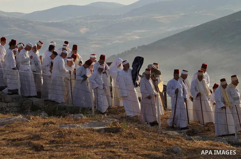 Members of the Samaritan sect take part in a traditional pilgrimage marking the holiday of Passover atop Mount Gerizim near the West Bank city of Nablus, on May 9, 2015. Samaritans have been present on the Land of Israel...