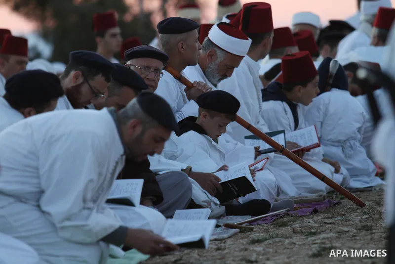 Members of the Samaritan sect take part in a traditional pilgrimage marking the holiday of Passover atop Mount Gerizim near the West Bank city of Nablus, on May 9, 2015. Samaritans have been present on the Land of Israel...