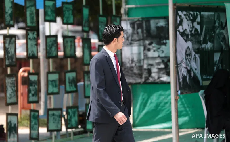 Palestinians take part in a photo exhibition ahead of the commemorations of the 67th anniversary of the ''Nakba'', in Gaza city on May 12, 2015. ''Nakba'' means in Arabic ''catastrophe'' in reference to the birth of the...