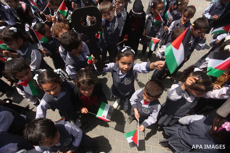 Palestinian children take part in a march ahead of the commemorations of the 67th anniversary of the ''Nakba'', in Gaza city on May 13, 2015. ''Nakba'' means in Arabic ''catastrophe'' in reference to the birth of the sta...