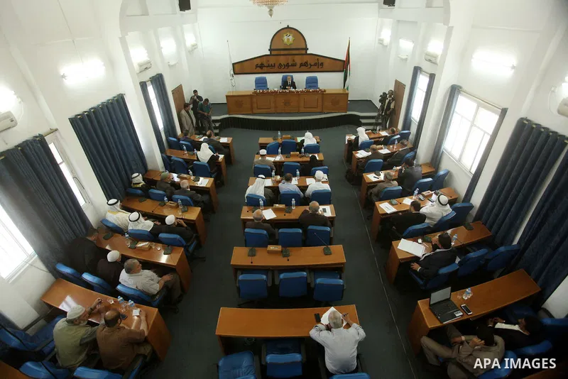 Members of the Palestinian legislative council from Hamas movement attend a meeting at the legislative council in Gaza city on May 13, 2015. Photo by Ashraf Amra