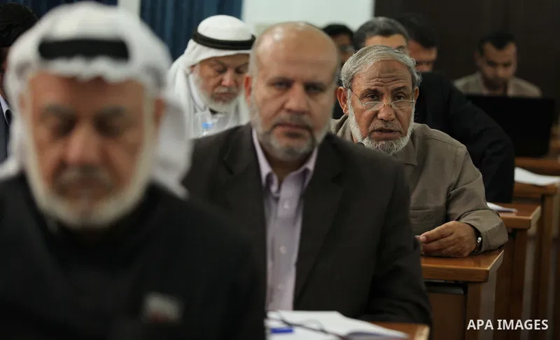 Members of the Palestinian legislative council from Hamas movement attend a meeting at the legislative council in Gaza city on May 13, 2015. Photo by Ashraf Amra