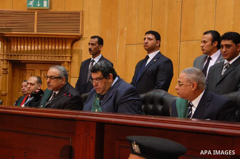 Egyptian judge Shaban el-Shamy reads out the verdict sentencing former Egyptian President Mohamed Mursi and other Muslim Brotherhood members at a court in the outskirts of Cairo, Egypt May 16, 2015. An Egyptian court on...